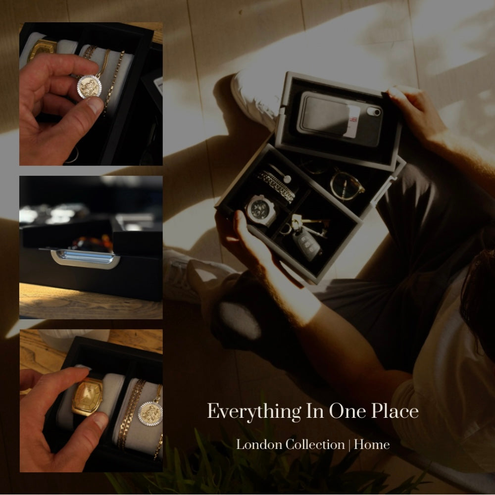 Square composite lifestyle image of the black LDN Il men's watch, jewellery and accessory organiser by Transform. Main shot shows the organiser filled with a phone, watch, necklace, car keys and glasses in a man's hands, with three smaller close-up sections highlighting individual accessories. Text overlay reads 'Everything in one place. London Collection / Home.