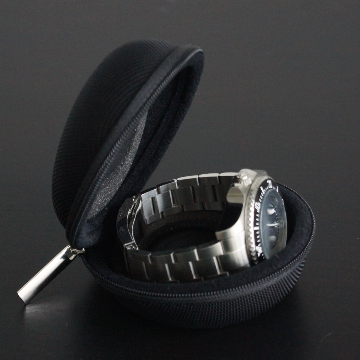 Front view of the Solo Explorer men’s single watch case by Transform with a watch inside.