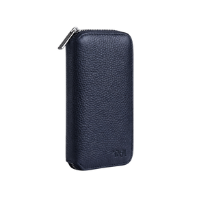 Compact jewellery travel case in navy leather with no background.
