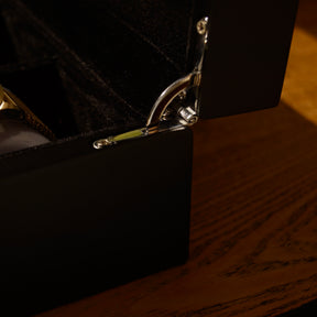 Close-up of the silver hinge detail on the LDN VI men’s 6-slot black watch box by Transform.