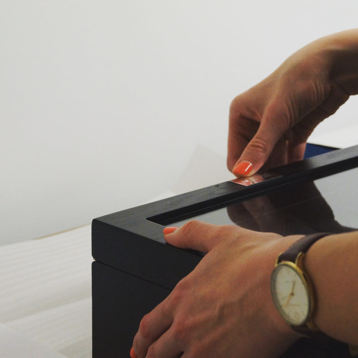 Personalised engraving plate being added to a watch box by Transform