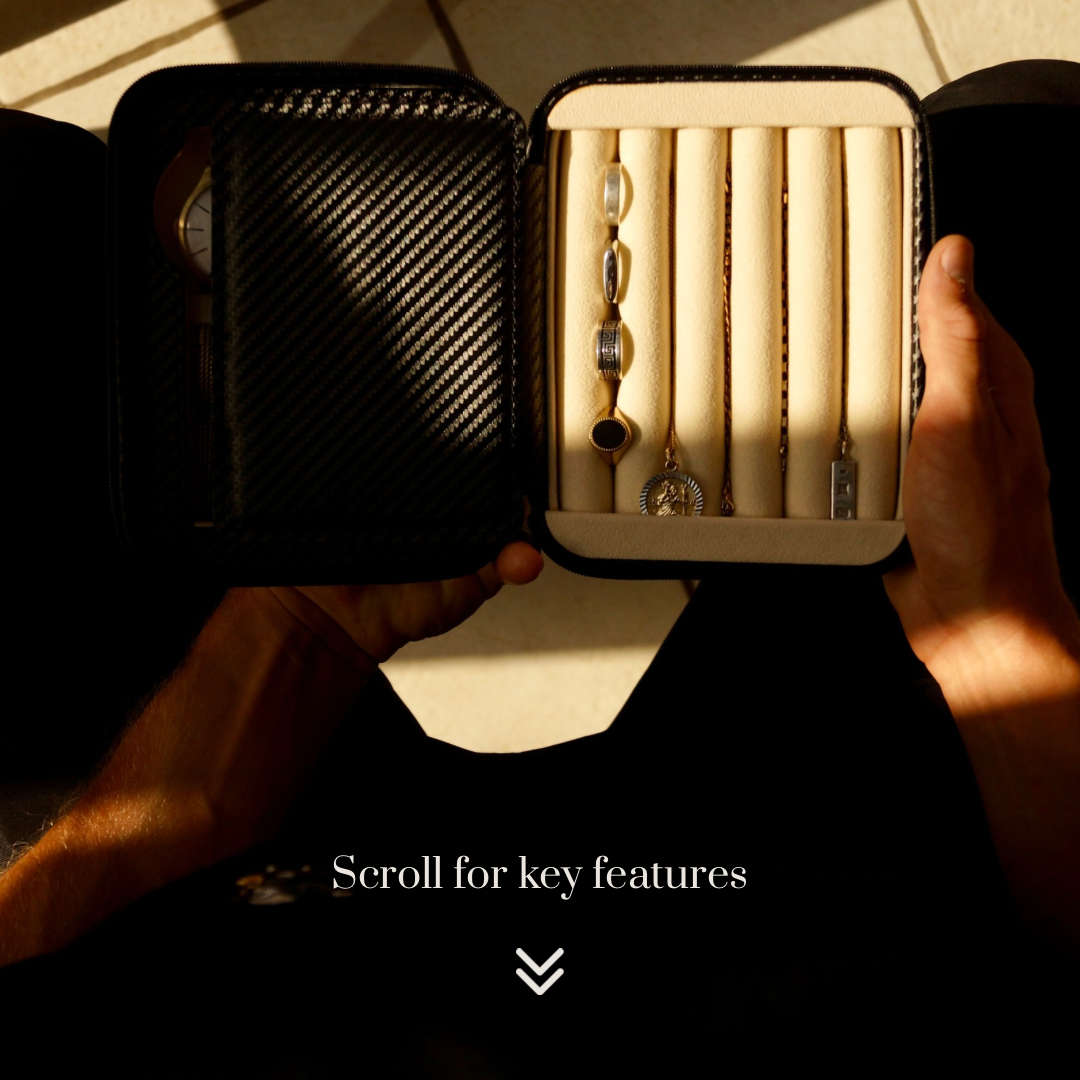 Bird’s-eye lifestyle view of the Stealth II men’s 2-slot watch and jewellery case by Transform, held by a man and filled with two watches, necklaces, bracelets and rings.