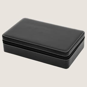 A rectangular black zippered 10-slot watch case with a carbon fiber textured pattern on the sides and a smooth black faux-leather top, shown on a light beige background.