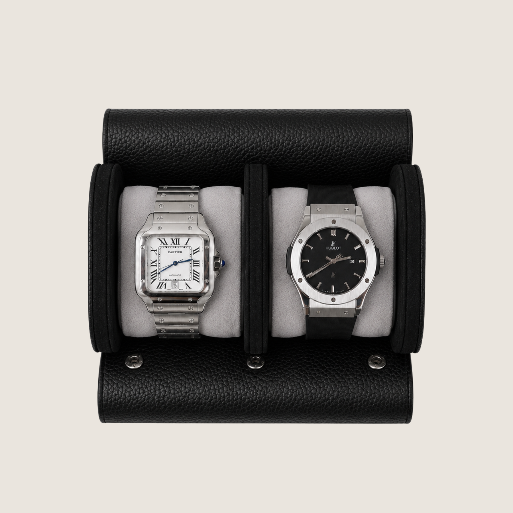 A black pebbled leather watch roll with two watches displayed side by side.